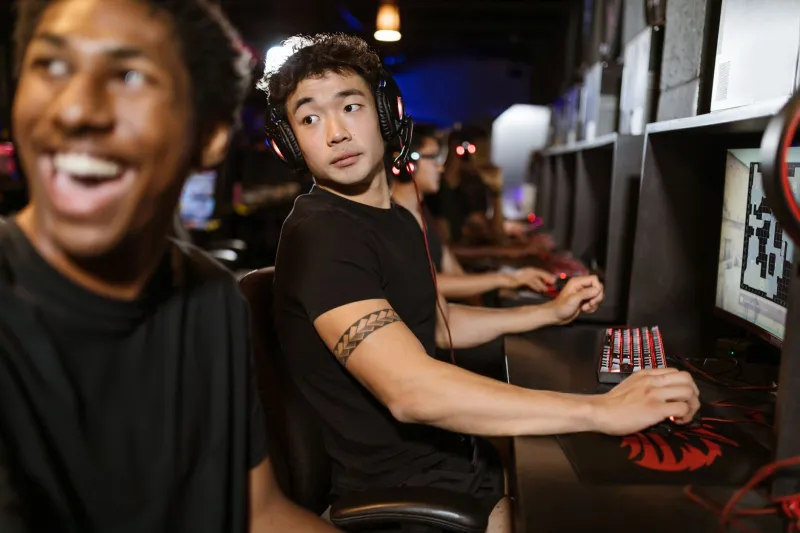 Cap and Gown, Gone: How College Esports Programs Are Raiding Clan Rosters — And What to Do About It